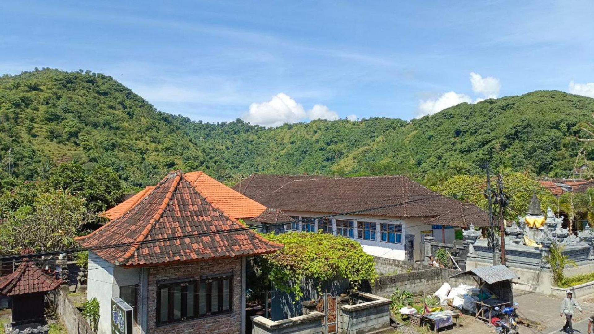 Local Hostel Amed Bagian luar foto